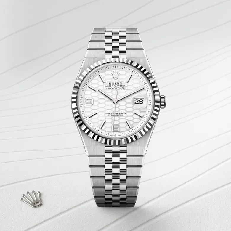 Rolex Land-Dweller 40mm in Oystersteel and white gold features a distinctive honeycomb motif dial.