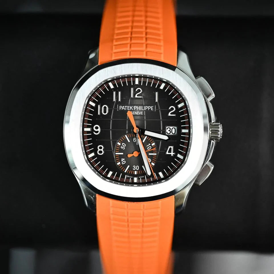 Aquanaut Chronograph Ref. 5968A-001 with a black embossed dial and an orange rubber strap.