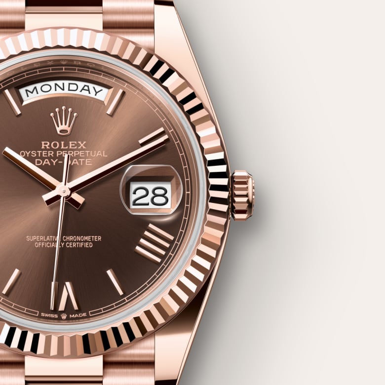 Rolex Day-Date 40 crafted in 18 ct Everose gold with a chocolate dial and a President bracelet.