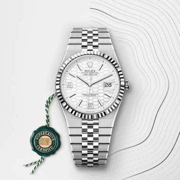 Rolex Land-Dweller 40mm in Oystersteel and white gold features a distinctive honeycomb motif dial.