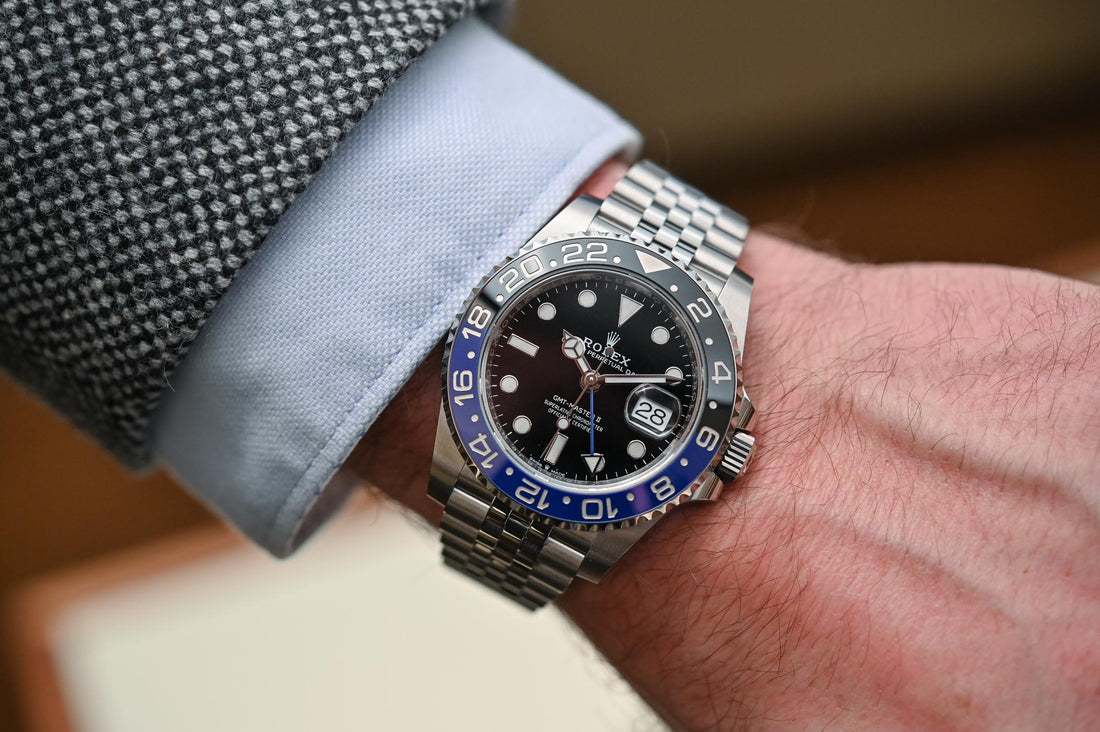 GMT-Master II, also known as the "Batgirl," which features a blue and black Cerachrom bezel and a Jubilee bracelet.